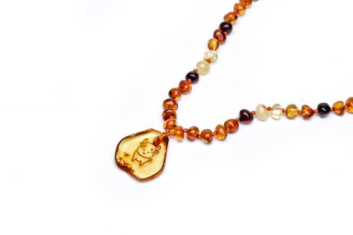 Teething necklace amber pendant taurus